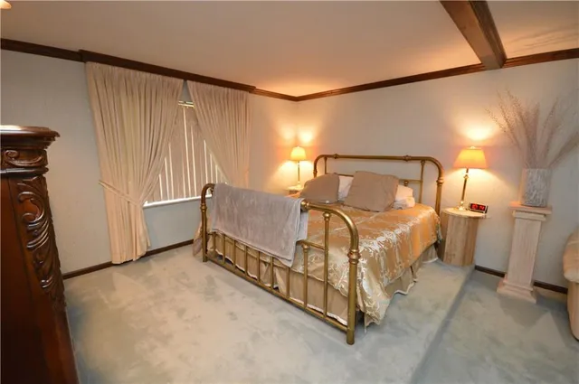 a bedroom with a bed and a closet