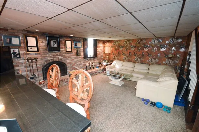 a view of a house with a tree