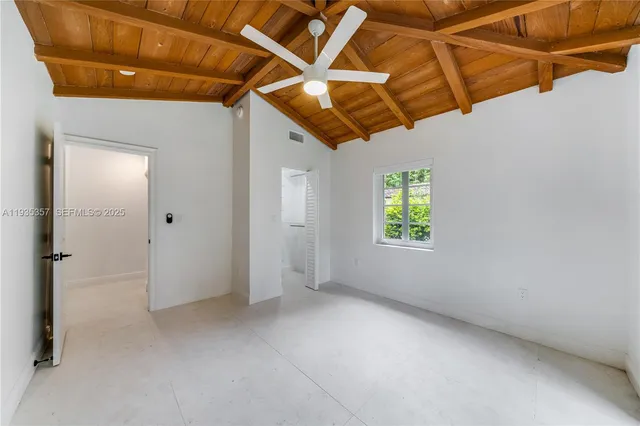 a view of a room with a window