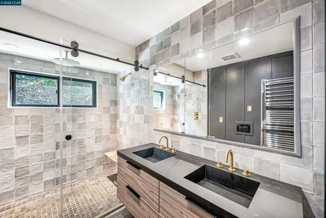 a living room with furniture and a piano