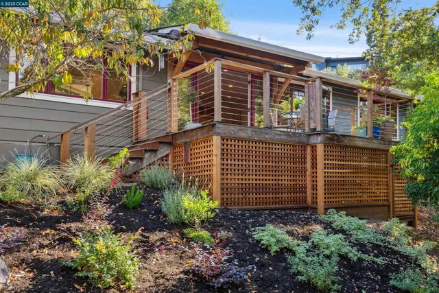 a view of a chairs and table in the patio