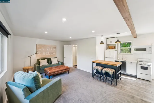 a view of a yard with large trees