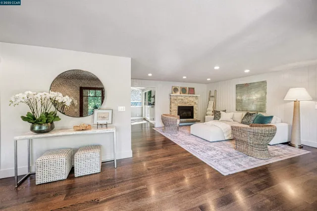 a kitchen with granite countertop a sink stainless steel appliances and cabinets