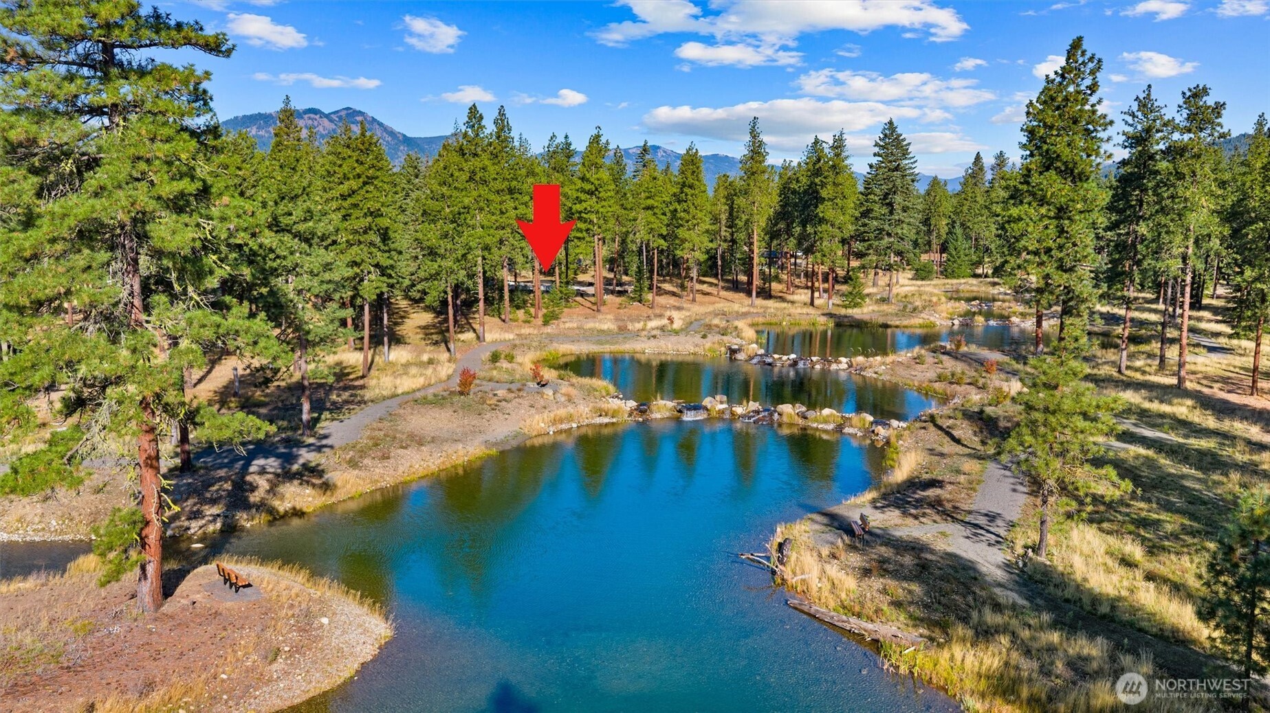 1891 Wanawish Loop Cle Elum, WA 98922 - Photo 16 of 21 a view of a swimming pool with an outdoor space and seating area