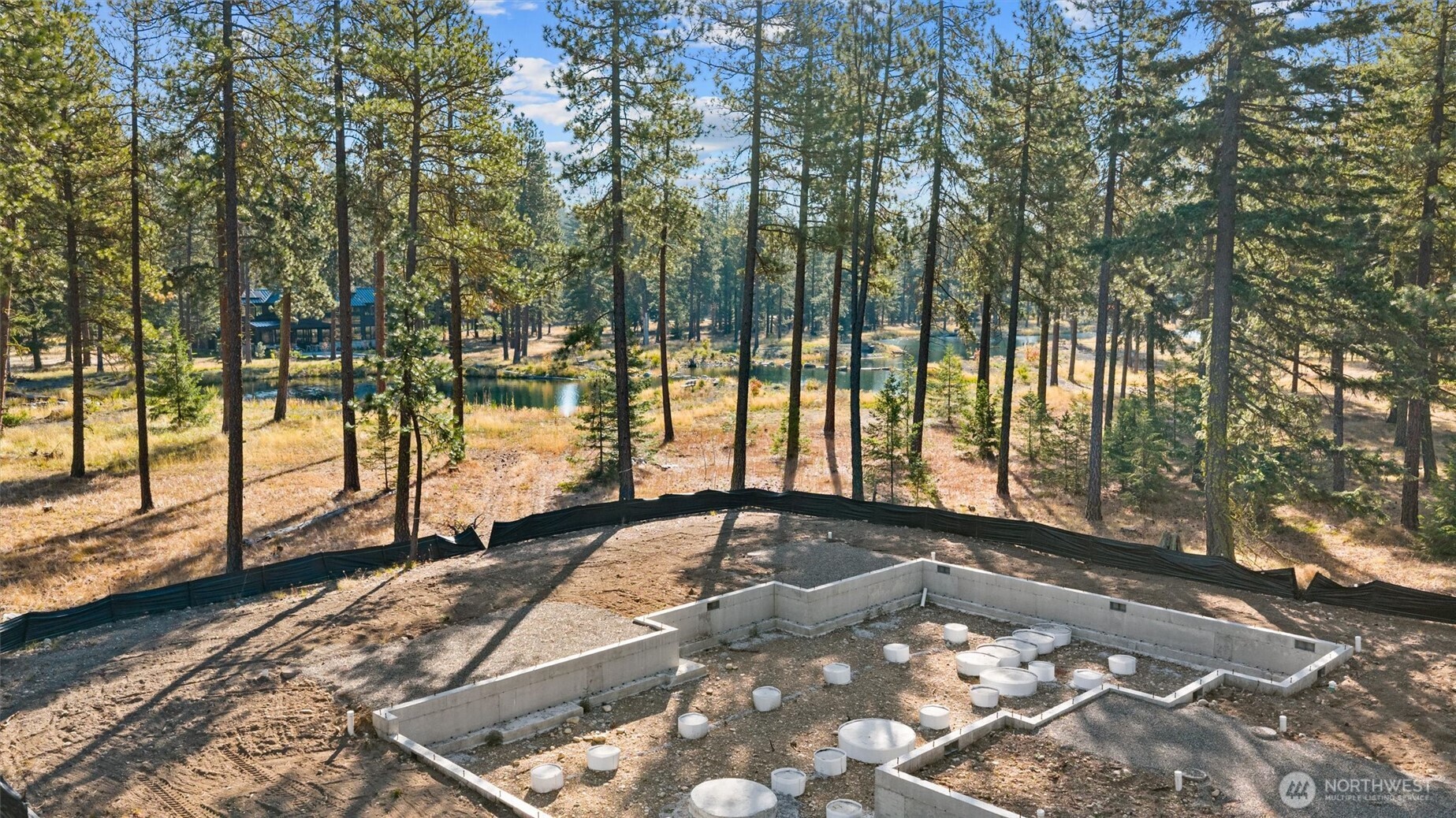1891 Wanawish Loop Cle Elum, WA 98922 - Photo 8 of 21 a view of backyard with large trees