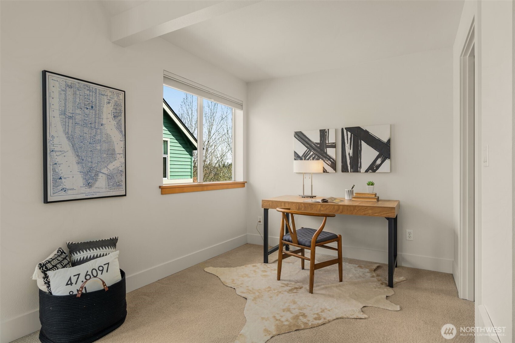 2815 24th Avenue South Seattle, WA 98144 - Photo 17 of 31 a view of a workspace with furniture