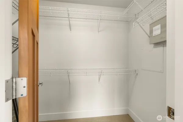 a view of a room with racks on the wall