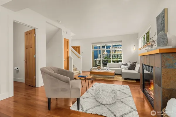 a living room with furniture and a large window