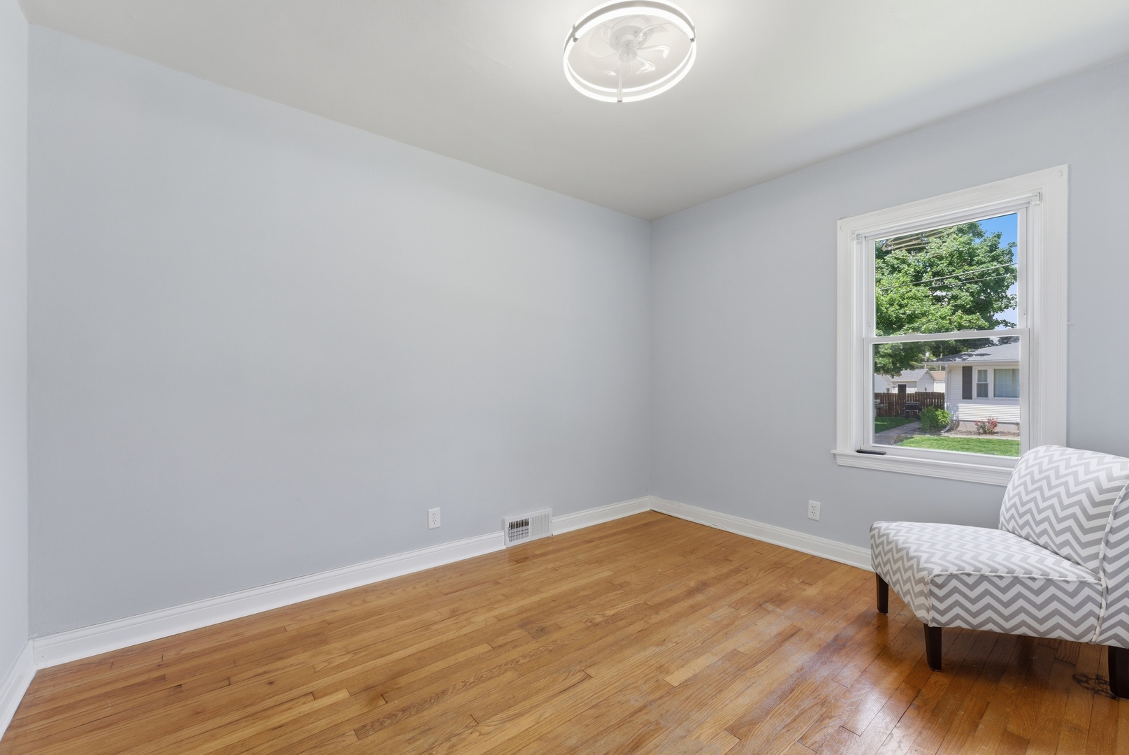 2405 31st Street Moline, IL 61265 - Photo 9 of 24 a room with a bed and a window
