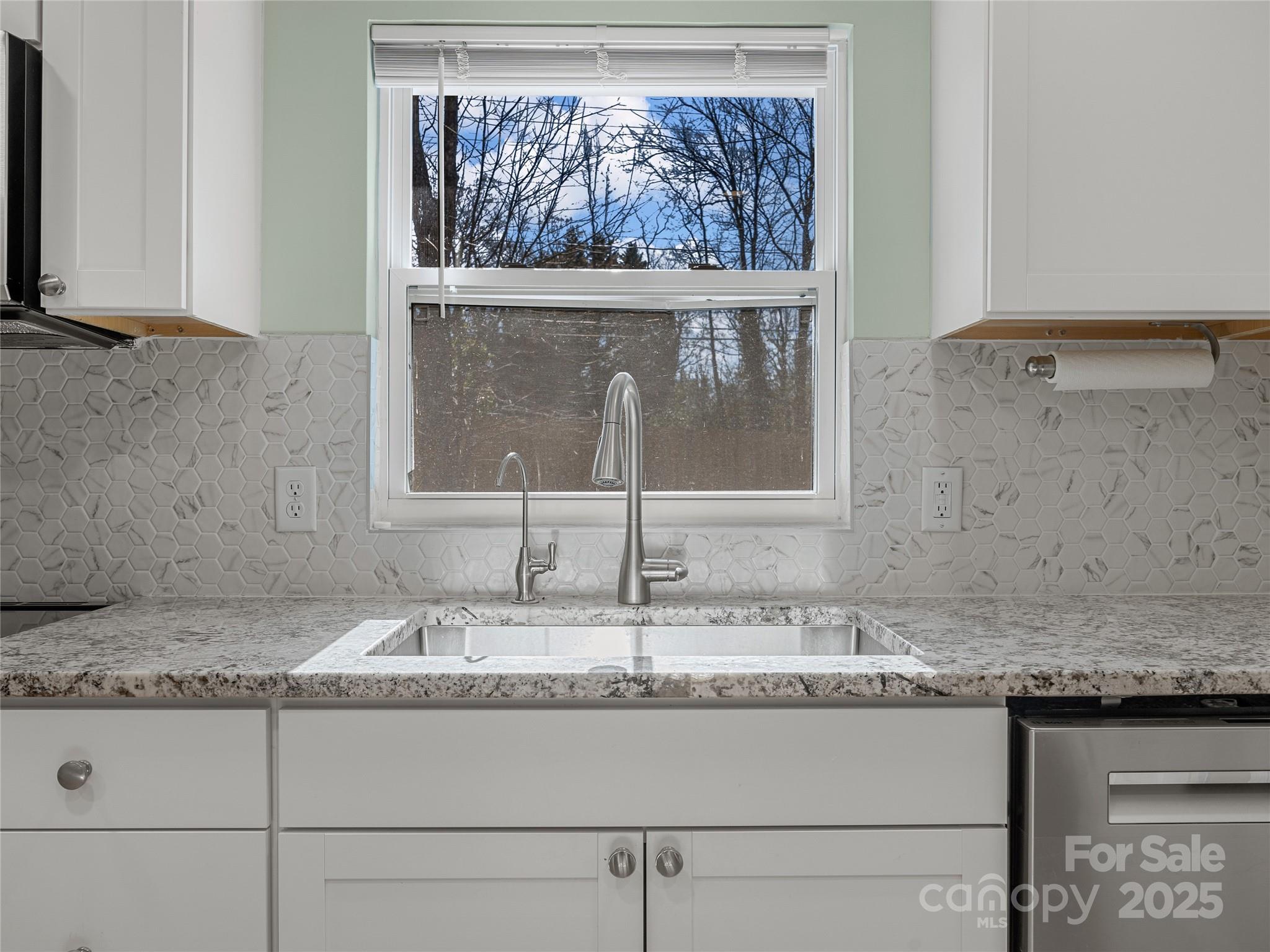 435 Thermal View Drive Tryon, NC 28782 - Photo 13 of 32 a bathroom with a granite countertop sink and a mirror