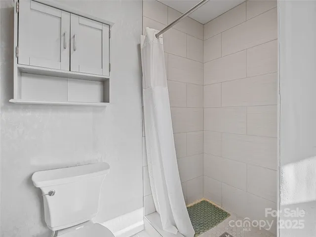 a bathroom with a sink and toilet