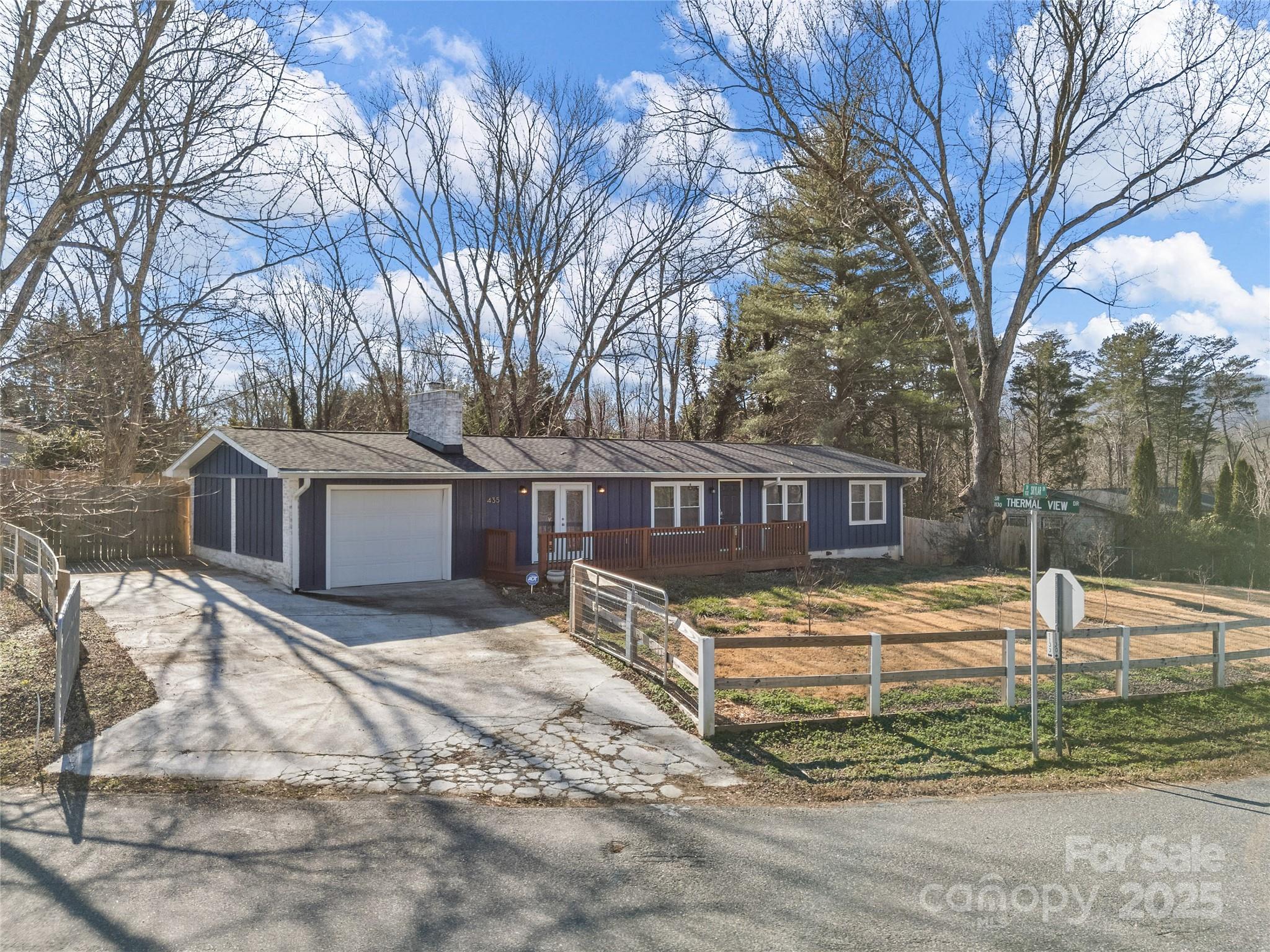 435 Thermal View Drive Tryon, NC 28782 - Photo 2 of 32 a view of a house with a yard covered in snow