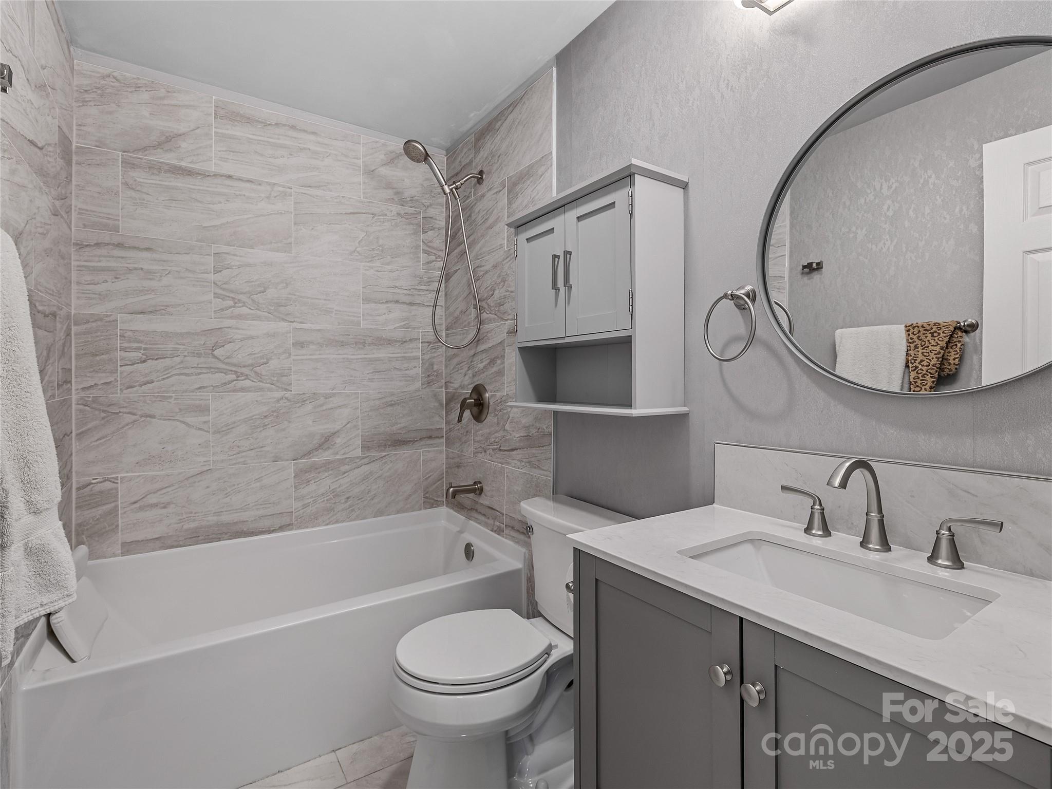 435 Thermal View Drive Tryon, NC 28782 - Photo 22 of 32 a bathroom with a sink toilet and shower