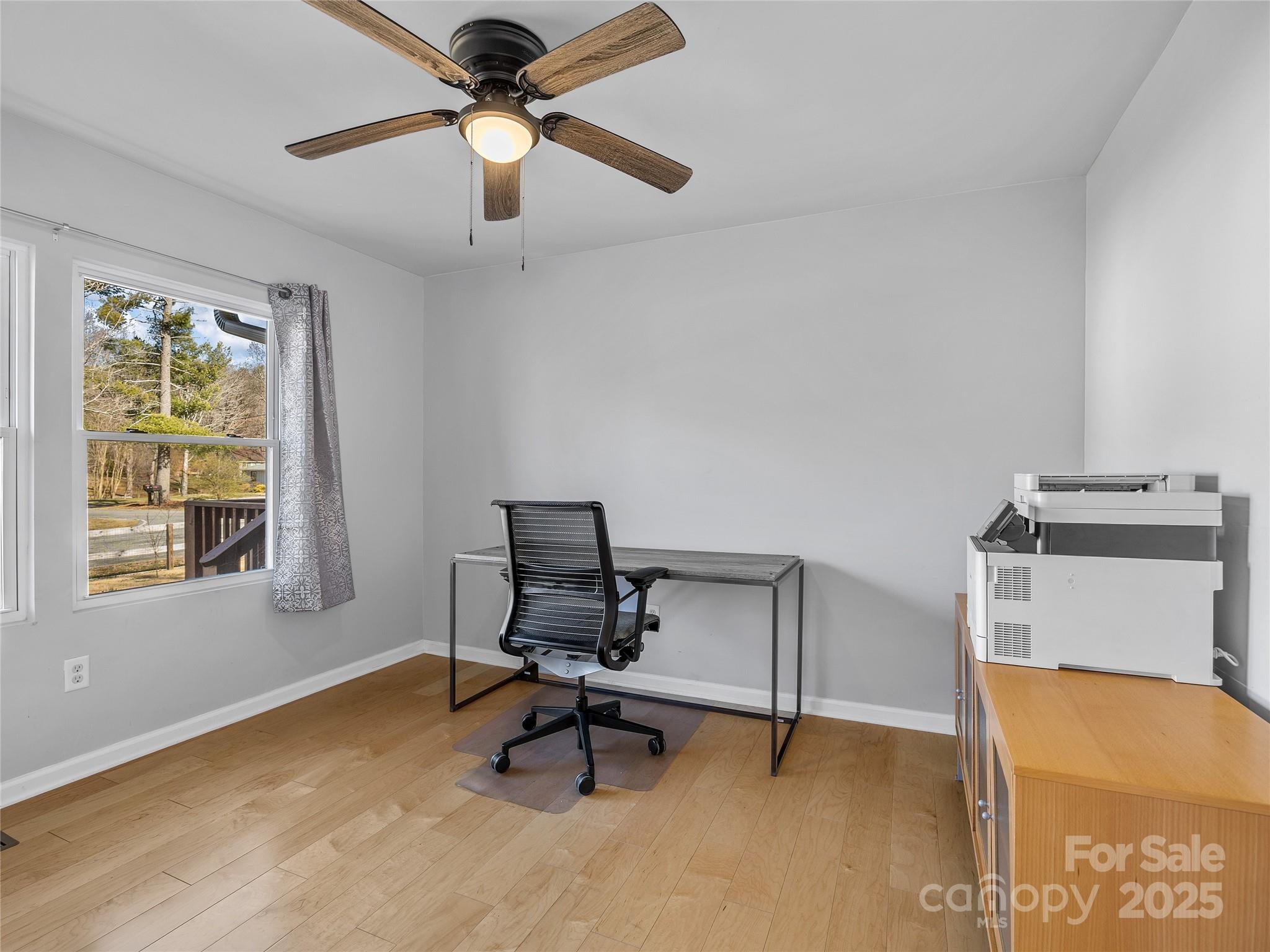435 Thermal View Drive Tryon, NC 28782 - Photo 23 of 32 a view of a workspace with furniture and a window