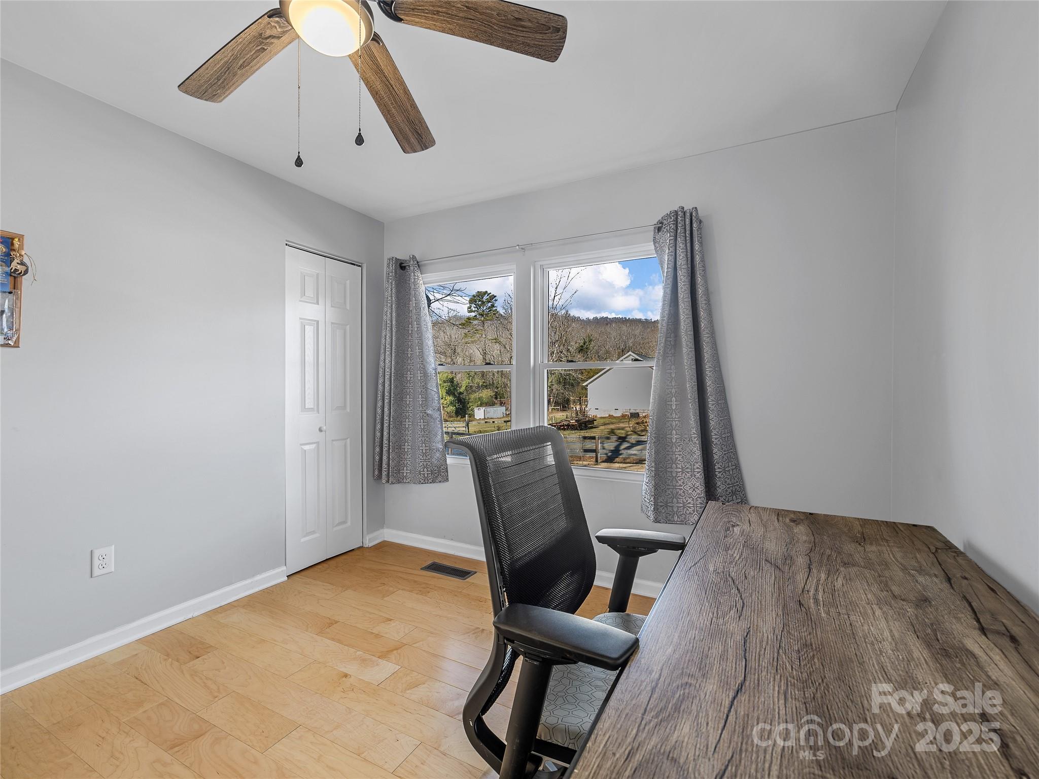 435 Thermal View Drive Tryon, NC 28782 - Photo 24 of 32 a view of a room with furniture window and wooden floor