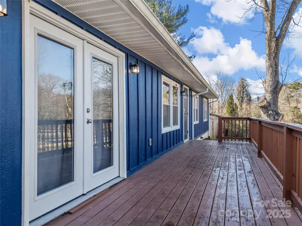 a view of a house on wooden deck