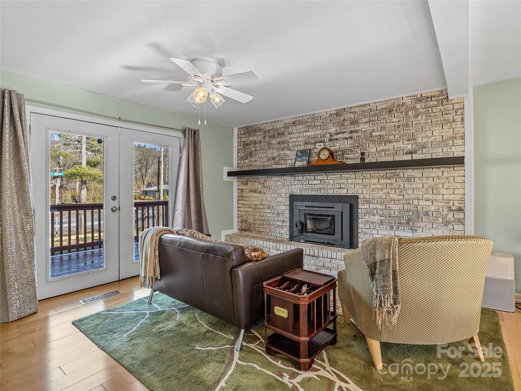 435 Thermal View Drive Tryon, NC 28782 - Photo 7 of 32 a living room with furniture and a fireplace