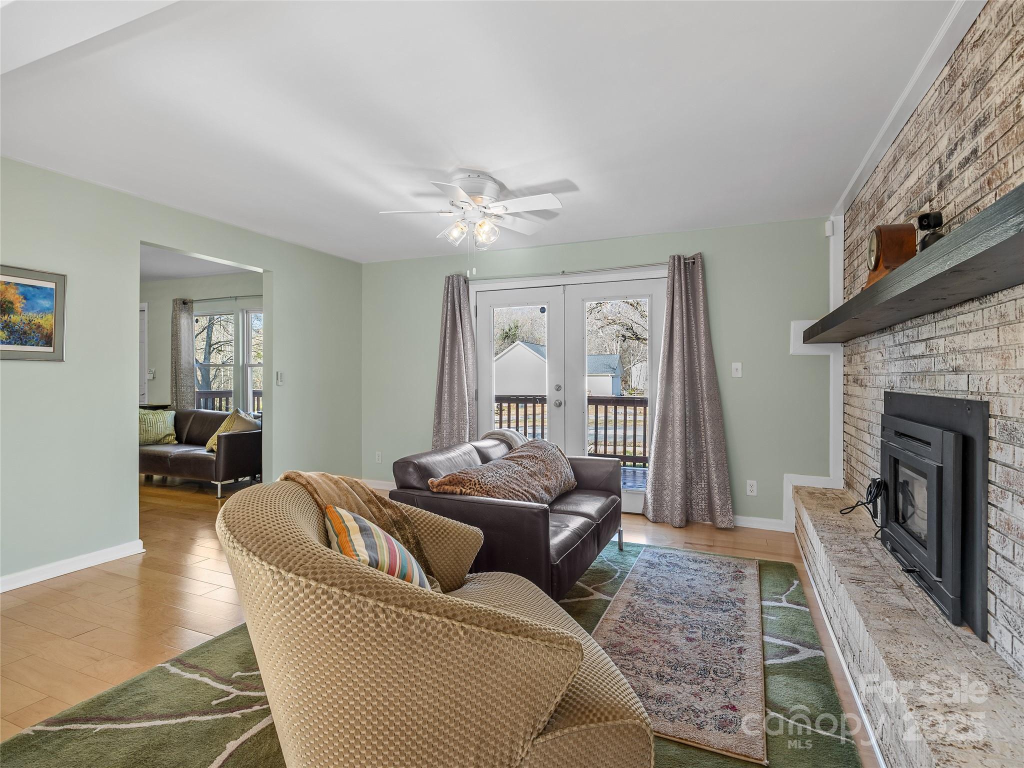 435 Thermal View Drive Tryon, NC 28782 - Photo 8 of 32 a living room with furniture and a fireplace