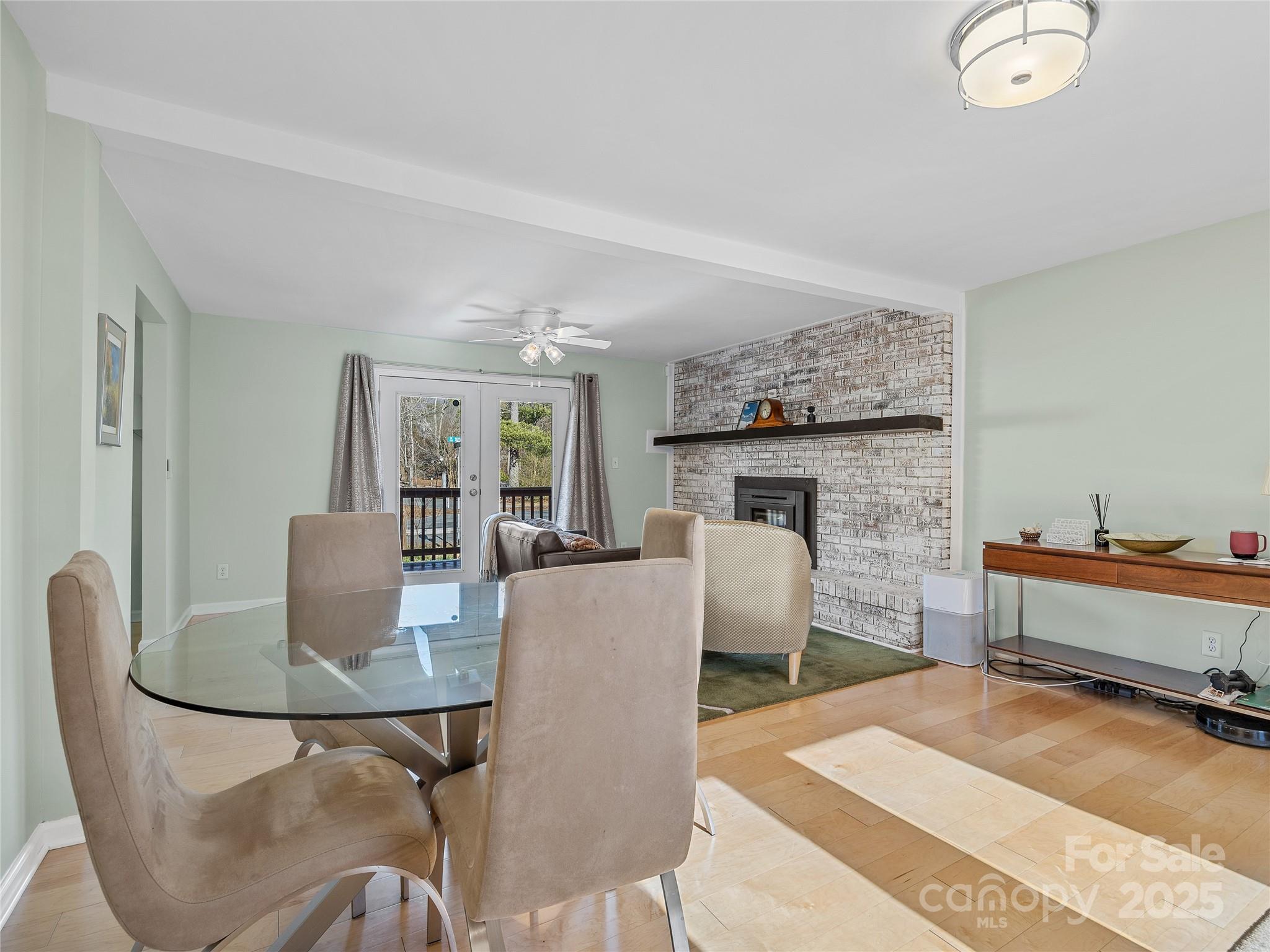 435 Thermal View Drive Tryon, NC 28782 - Photo 10 of 32 a living room with furniture and a fireplace