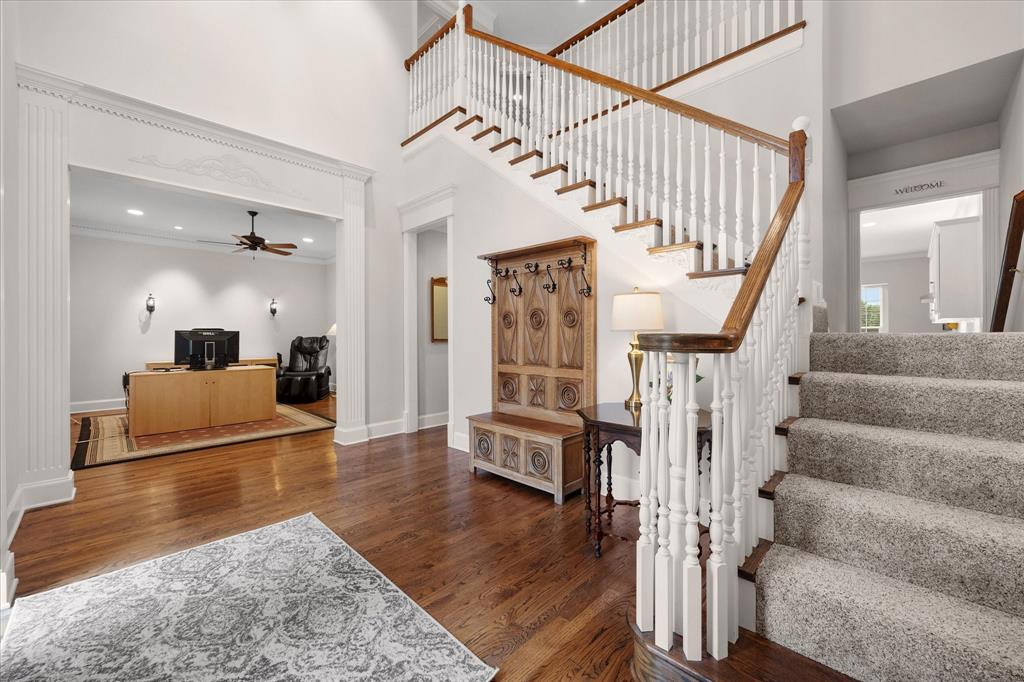 506 Meadowview Road Heath, TX 75032 - Photo 12 of 32 a view of entryway and hall with wooden floor