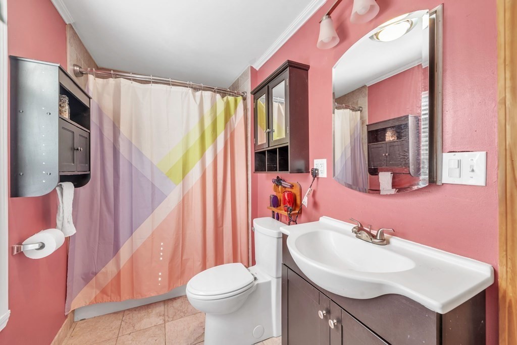41 Spring Street Warren, MA 01092 - Photo 19 of 42 a bathroom with a sink toilet and mirror