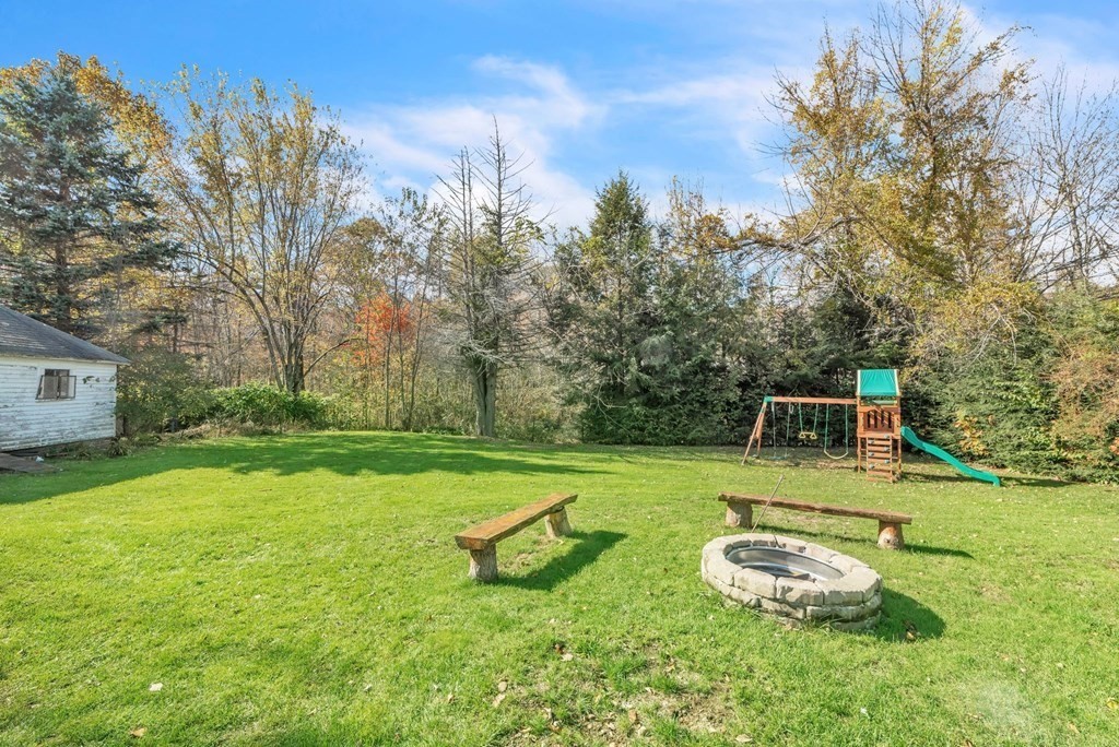 41 Spring Street Warren, MA 01092 - Photo 40 of 42 a view of a backyard with swimming pool