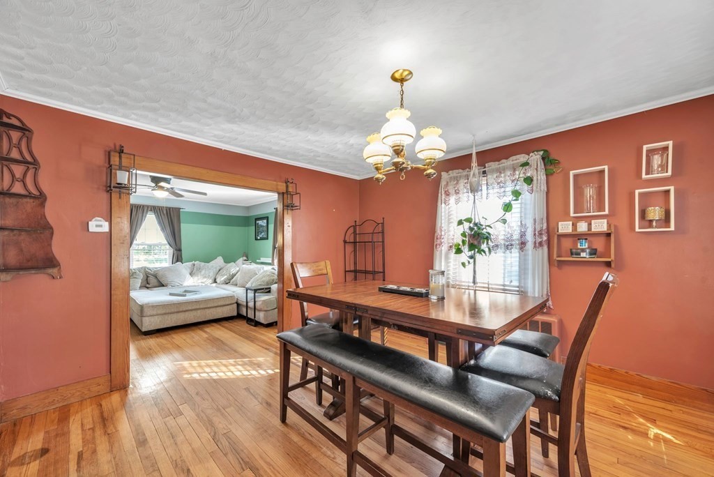 41 Spring Street Warren, MA 01092 - Photo 9 of 42 a dining room with furniture and wooden floor
