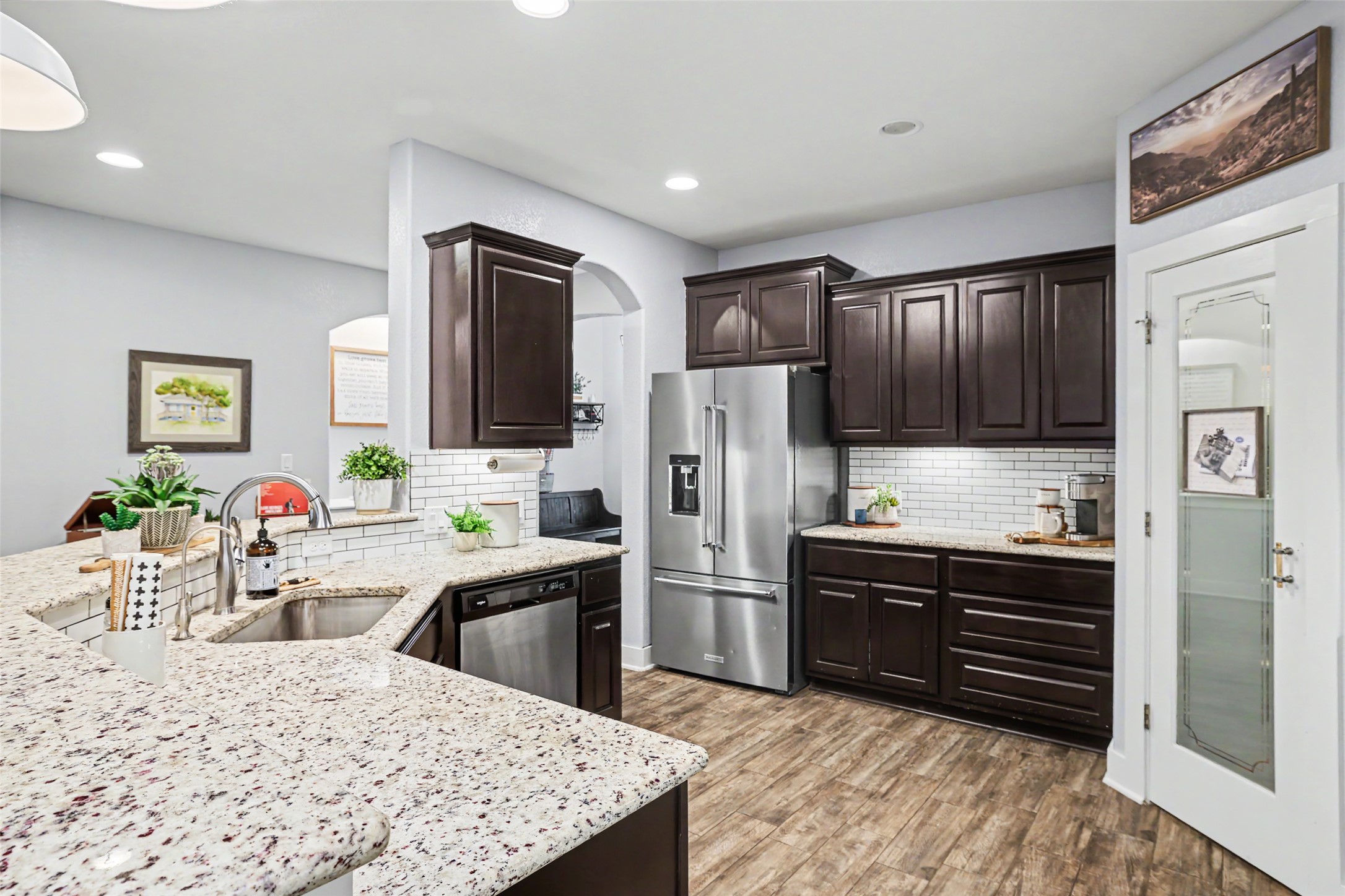 117 Rock Dock Road Georgetown, TX 78633 - Photo 14 of 38 a kitchen with refrigerator cabinets and furniture