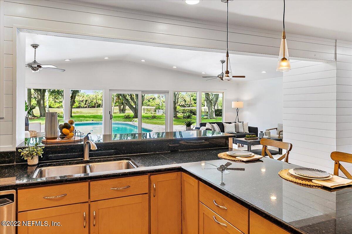 218 Pablo Road Ponte Vedra Beach, FL 32082 - Photo 15 of 42 a kitchen with a sink and a large window