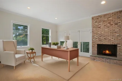 a view of a hallway with wooden floor and glass door