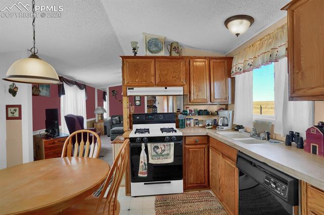 4685 South Yoder Road Yoder, CO 80864 - Photo 13 of 32 Eat-in kitchen.