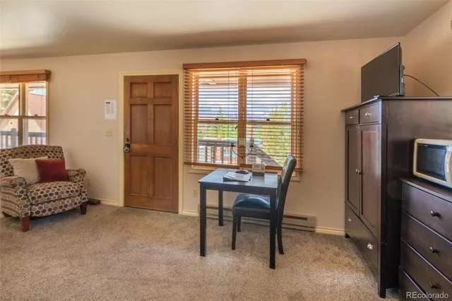 a bathroom with a toilet and a sink