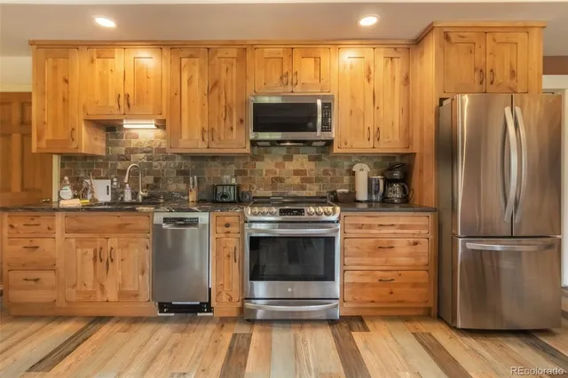 a view of a room with a large window