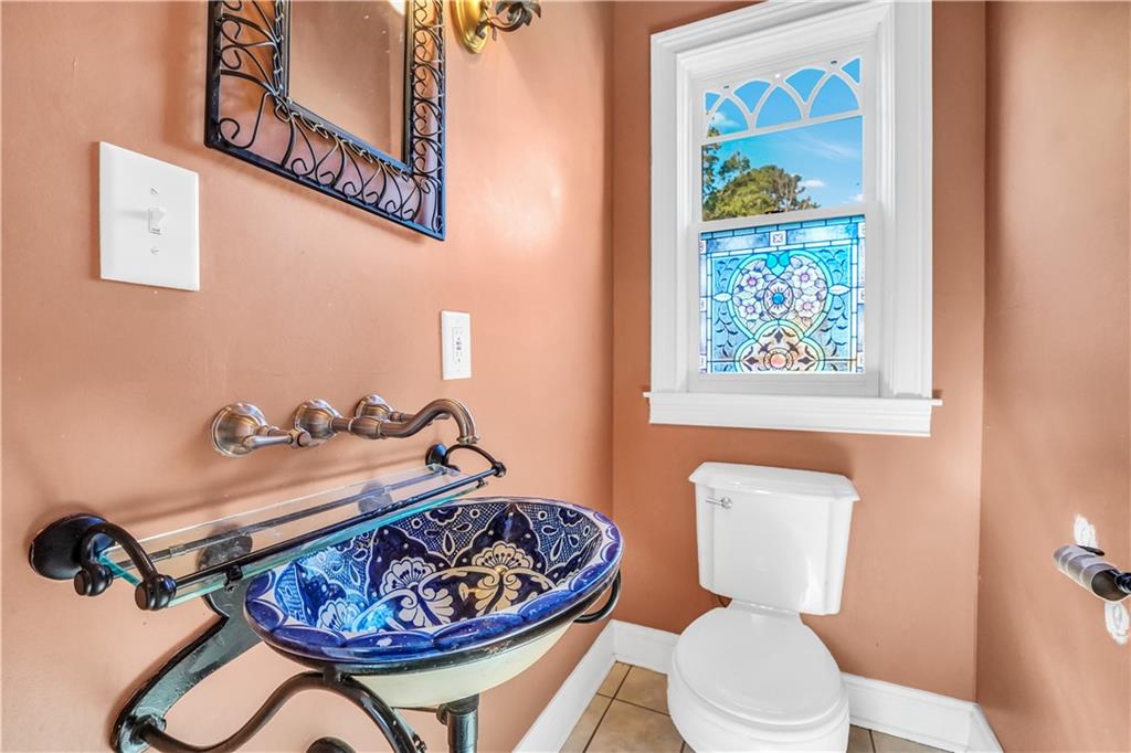 265 Kudzu Road Jenkinsburg, GA 30234 - Photo 22 of 38 a bathroom with a toilet and a sink