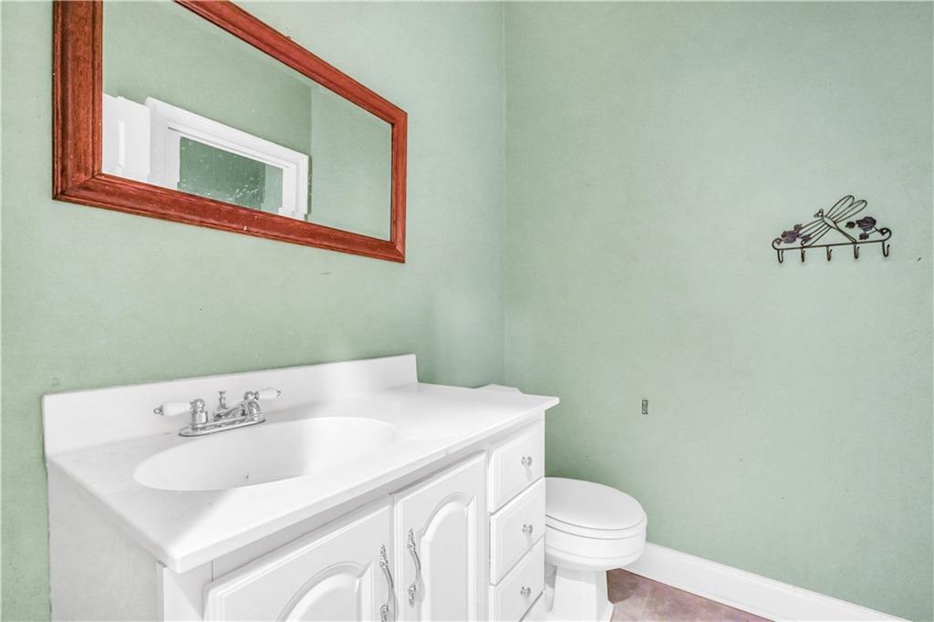 265 Kudzu Road Jenkinsburg, GA 30234 - Photo 32 of 38 a bathroom with a sink and a toilet