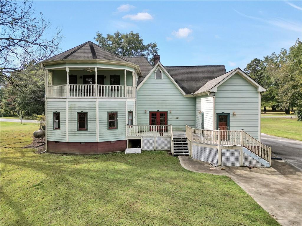 265 Kudzu Road Jenkinsburg, GA 30234 - Photo 38 of 38 a view of a house with a yard