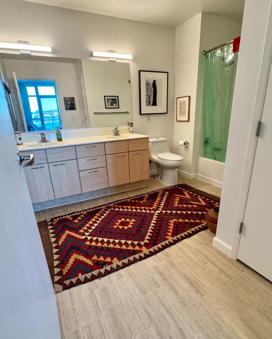 1 Lakeside Drive, Unit 602 Oakland, CA 94612 - Photo 24 of 26 a living room with furniture