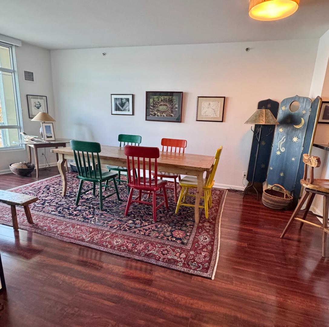 1 Lakeside Drive, Unit 602 Oakland, CA 94612 - Photo 8 of 26 a view of a dining room with furniture