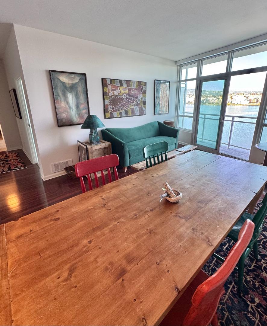 1 Lakeside Drive, Unit 602 Oakland, CA 94612 - Photo 9 of 26 a room with a bed and a large window