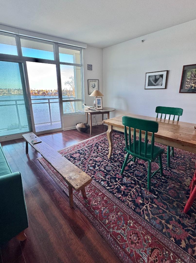 1 Lakeside Drive, Unit 602 Oakland, CA 94612 - Photo 10 of 26 a living room with a rug couches and a coffee table