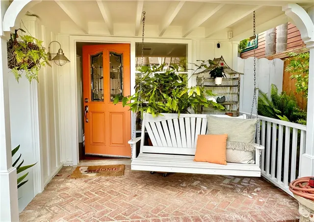 a view of porch with a bench