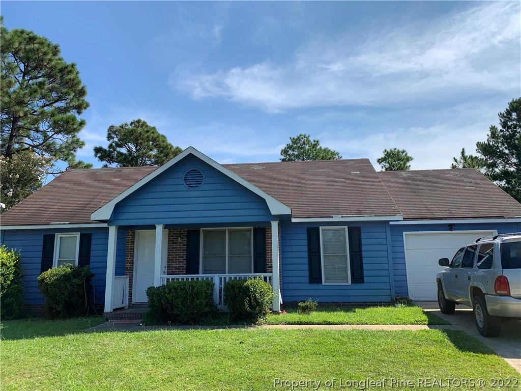 3336 Antler Drive Spring Lake, NC 28390 - Photo 2 of 3 a view of a house with a yard and plants
