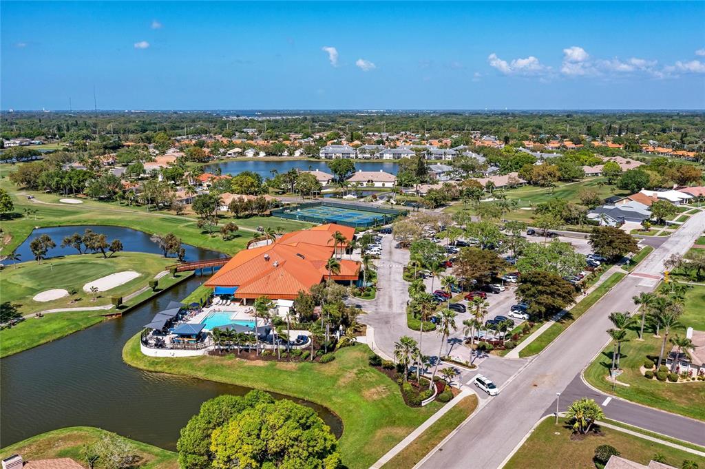 4906 Peridia Boulevard East Bradenton, FL 34203 - Photo 46 of 64 an aerial view of a residential houses with outdoor space