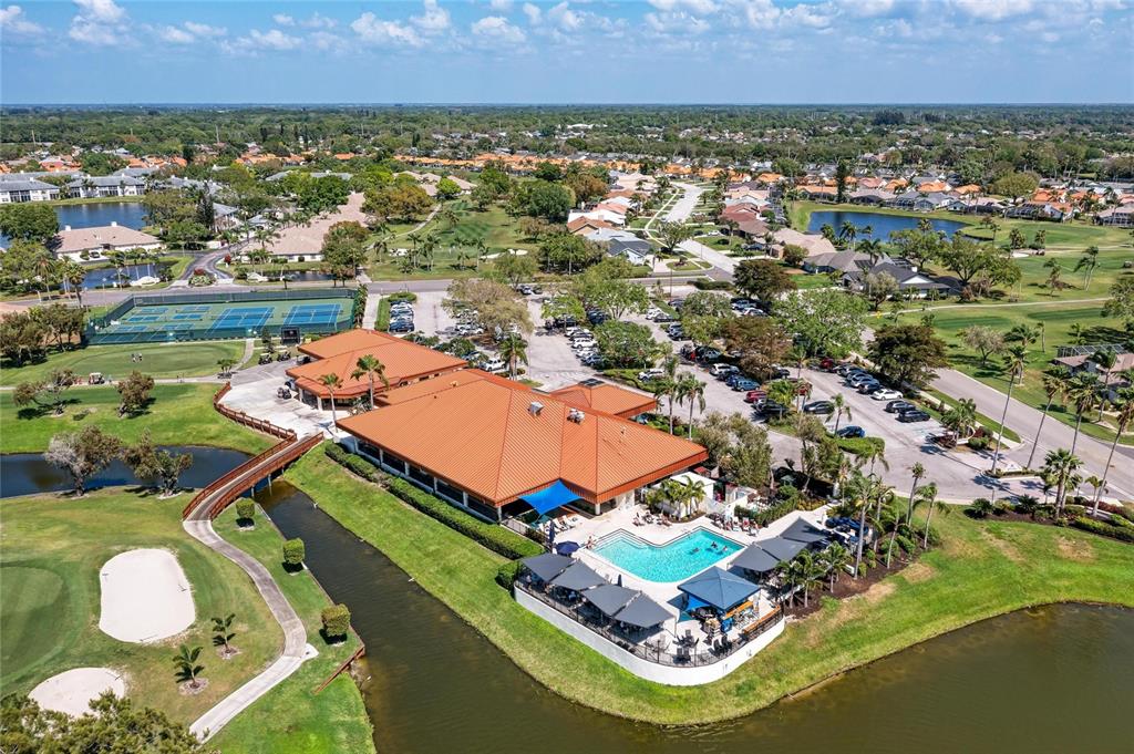 4906 Peridia Boulevard East Bradenton, FL 34203 - Photo 50 of 64 an aerial view of residential houses with outdoor space
