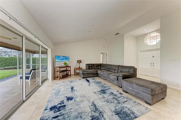 a living room with furniture and a couch