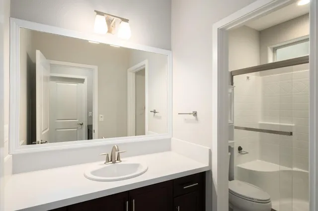 a view of staircase with white walls