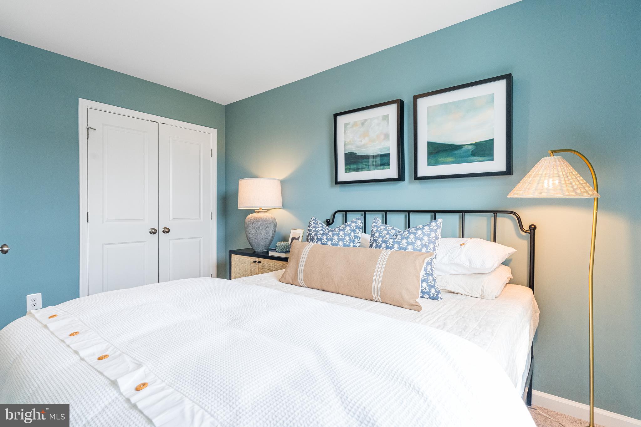 205 Swan Fld Avenue Ranson, WV 25438 - Photo 8 of 21 a bedroom with a bed and a painting on the wall