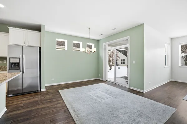 a view of livingroom with kitchen