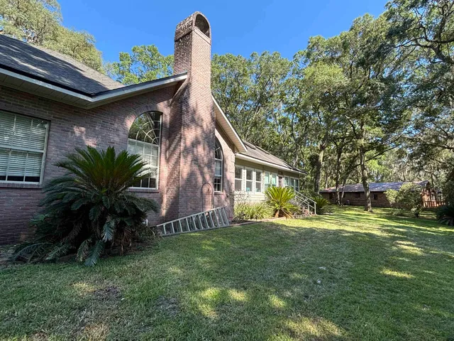 a house view with a garden space
