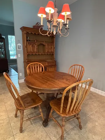 a table and chairs in a room